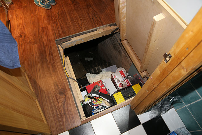 Guy Moves Into New Apartment, Finds A Hidden Trap Door That Wasn't In The Rental Agreement